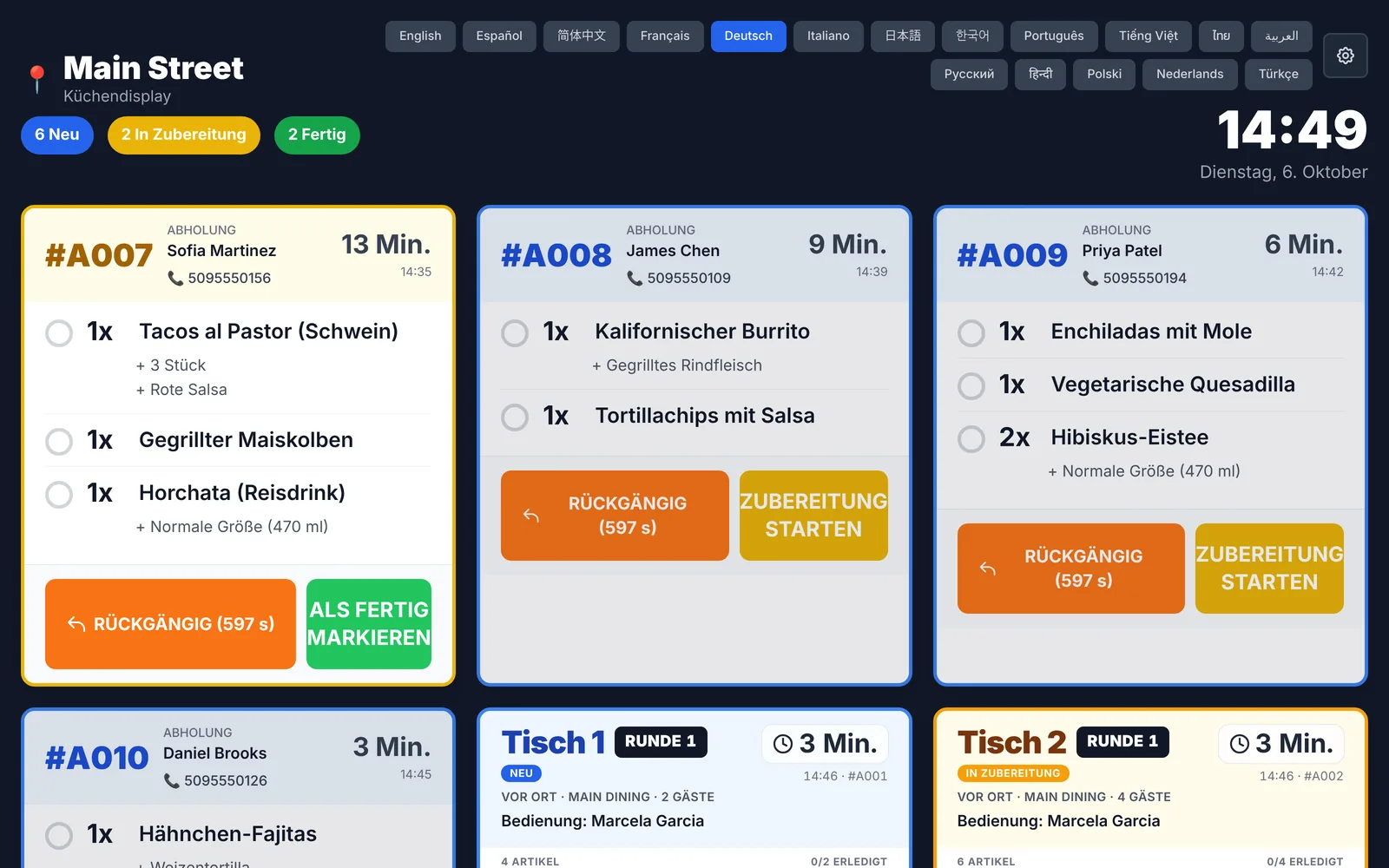 InnoOrder kitchen display in German: buttons, timers, dish names and modifiers all in German
