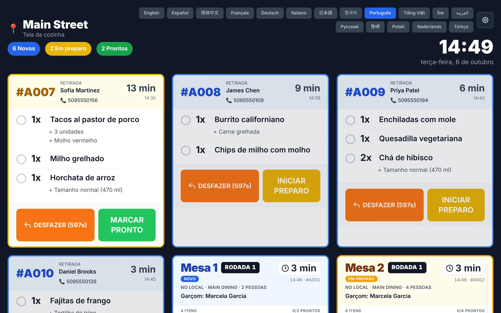 InnoOrder kitchen display in Portuguese: buttons, timers, dish names and modifiers all in Portuguese