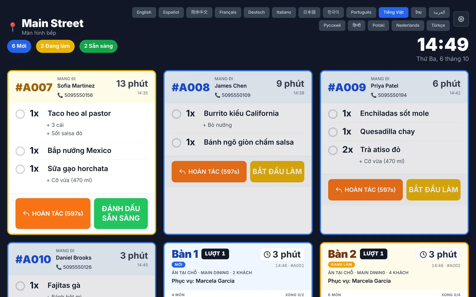 InnoOrder kitchen display in Vietnamese: buttons, timers, dish names and modifiers all in Vietnamese
